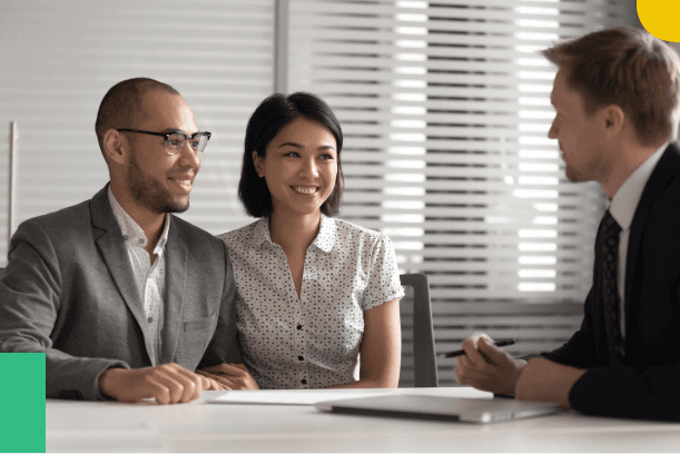 Business professionals collaborating at a meeting table